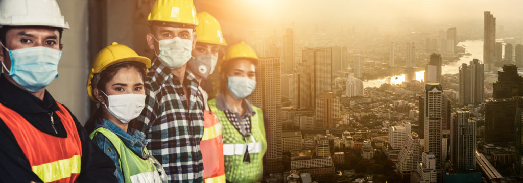 Factory workers with face mask protect from outbreak of Corona Virus Disease 2019 or COVID-19.