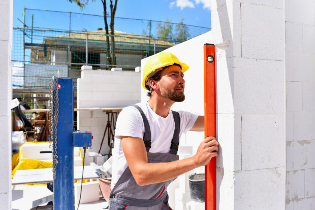 profession construction worker - work on a building site construction of a residential house