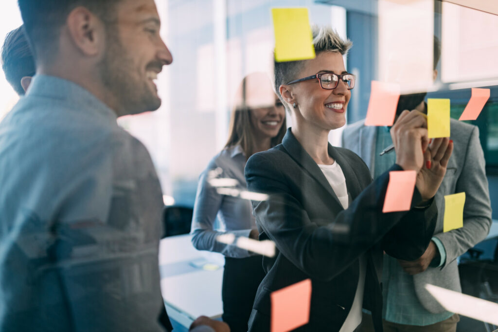 Group of coworkers working together on business project in office