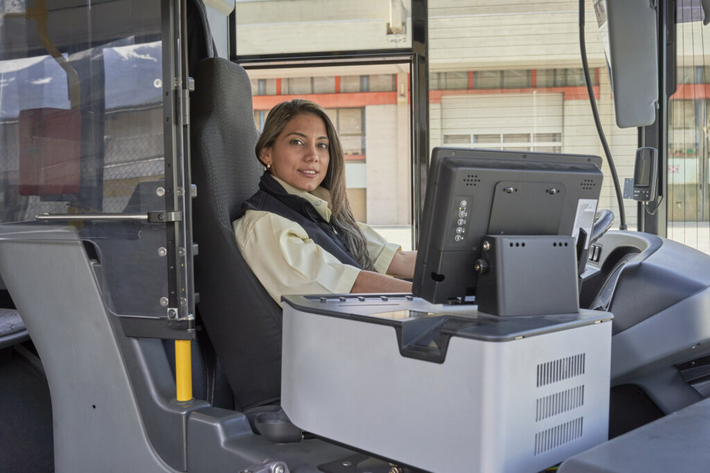a pretty driver woman working at day
